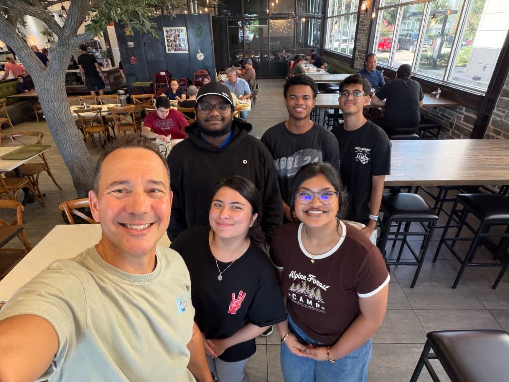 Team dinner selfie with Mike and the intern class